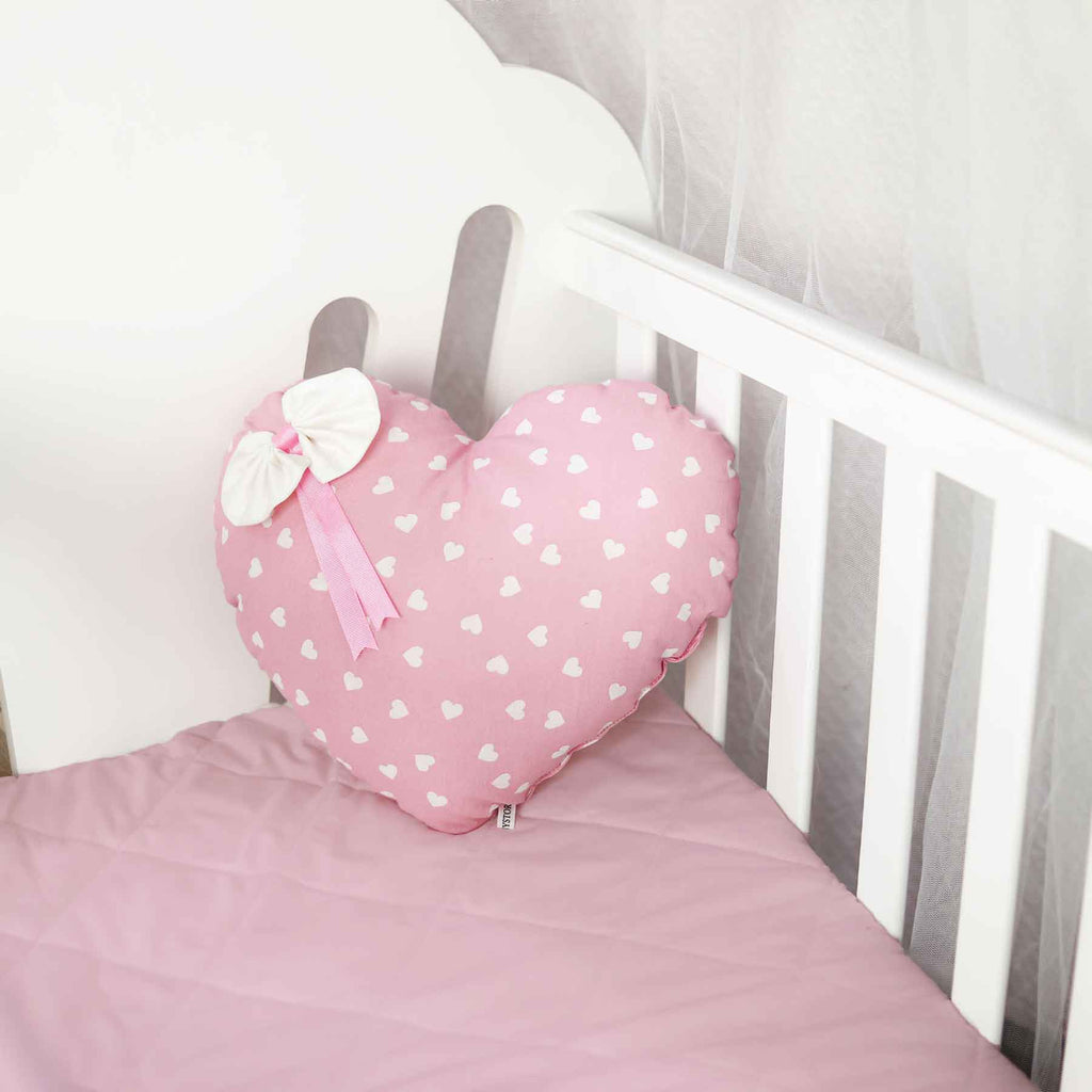 pink heart filled cushion