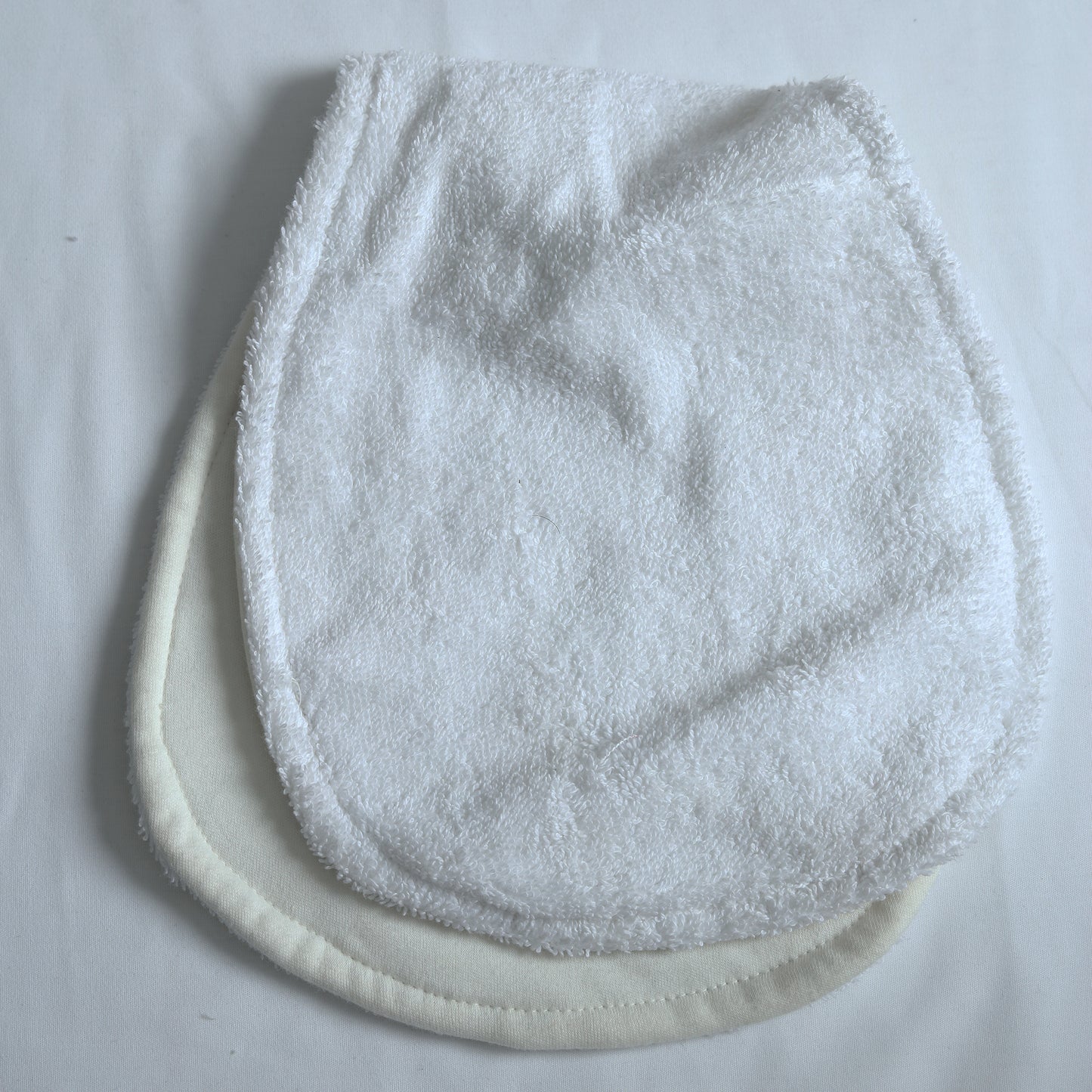 white towel baby burp cloth