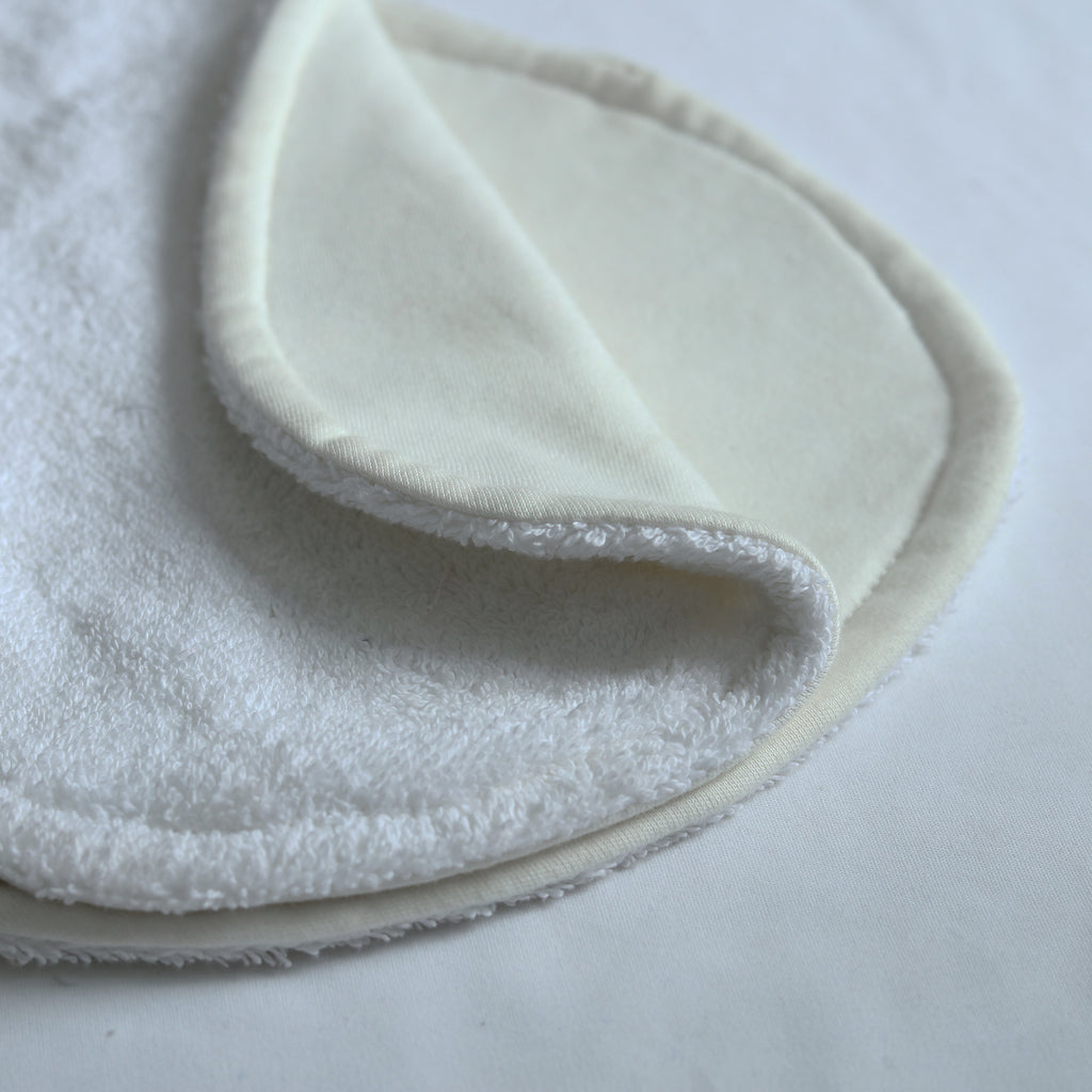 white towel baby burp cloth
