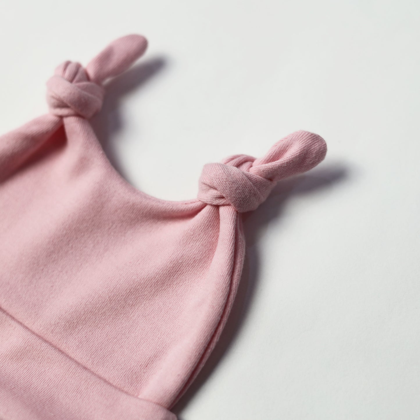 double knotted baby caps