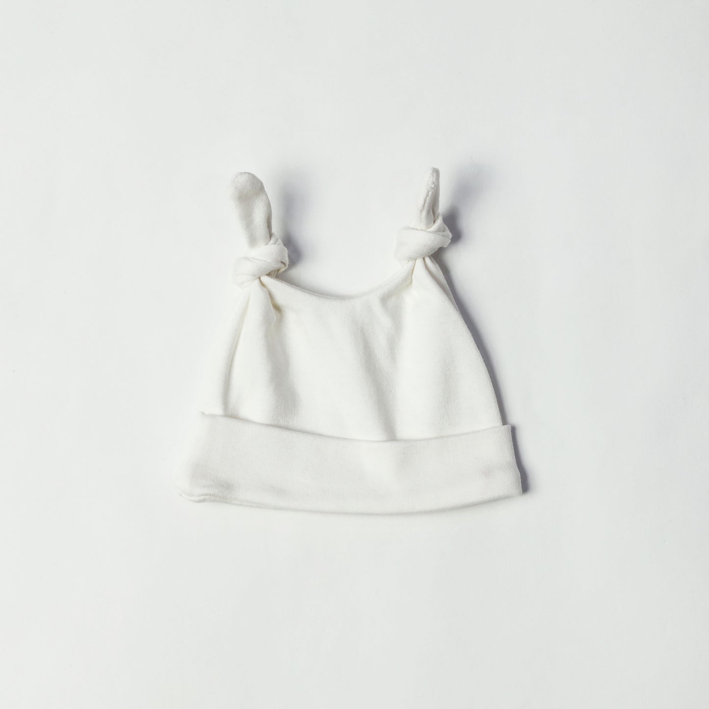 double knotted baby caps