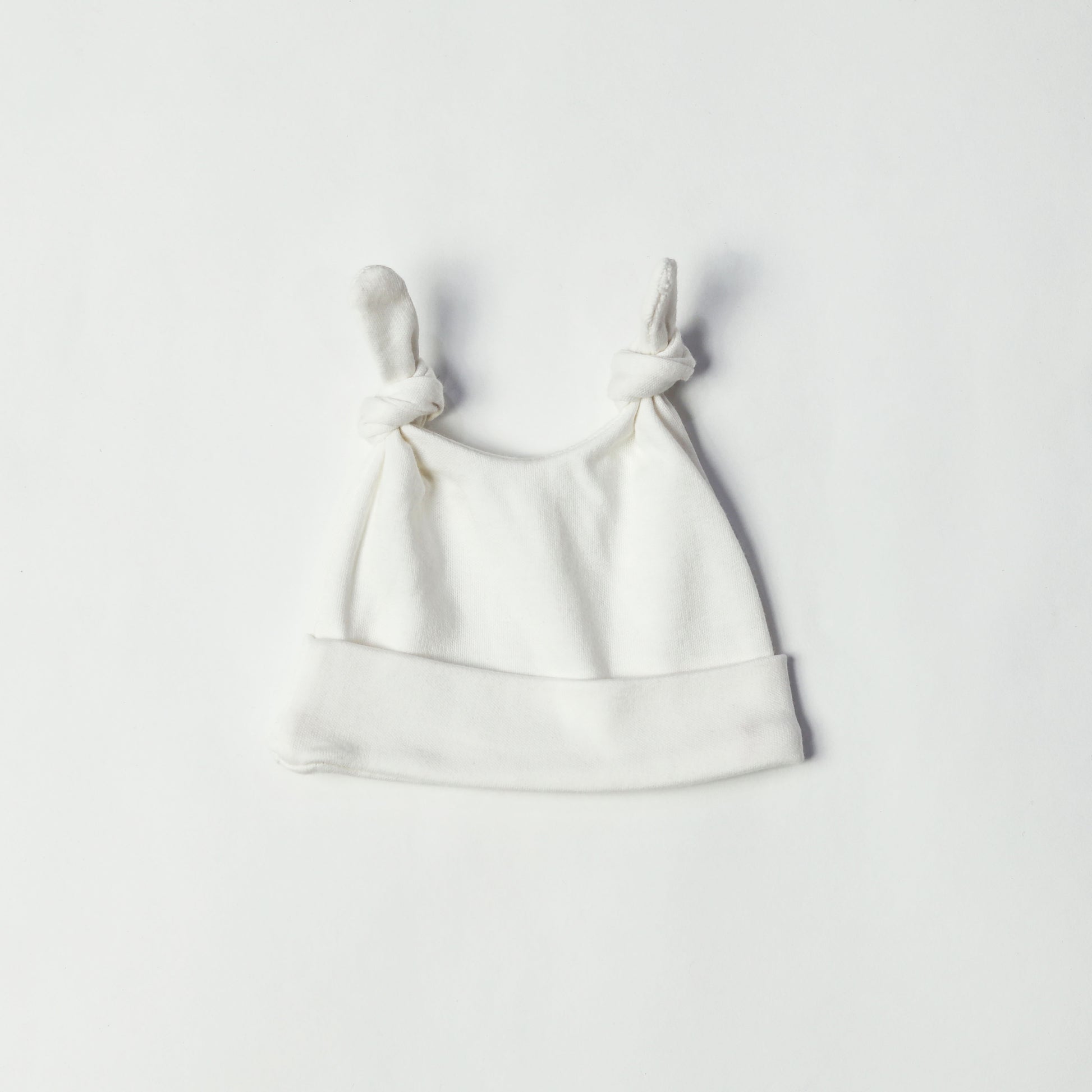 double knotted baby caps