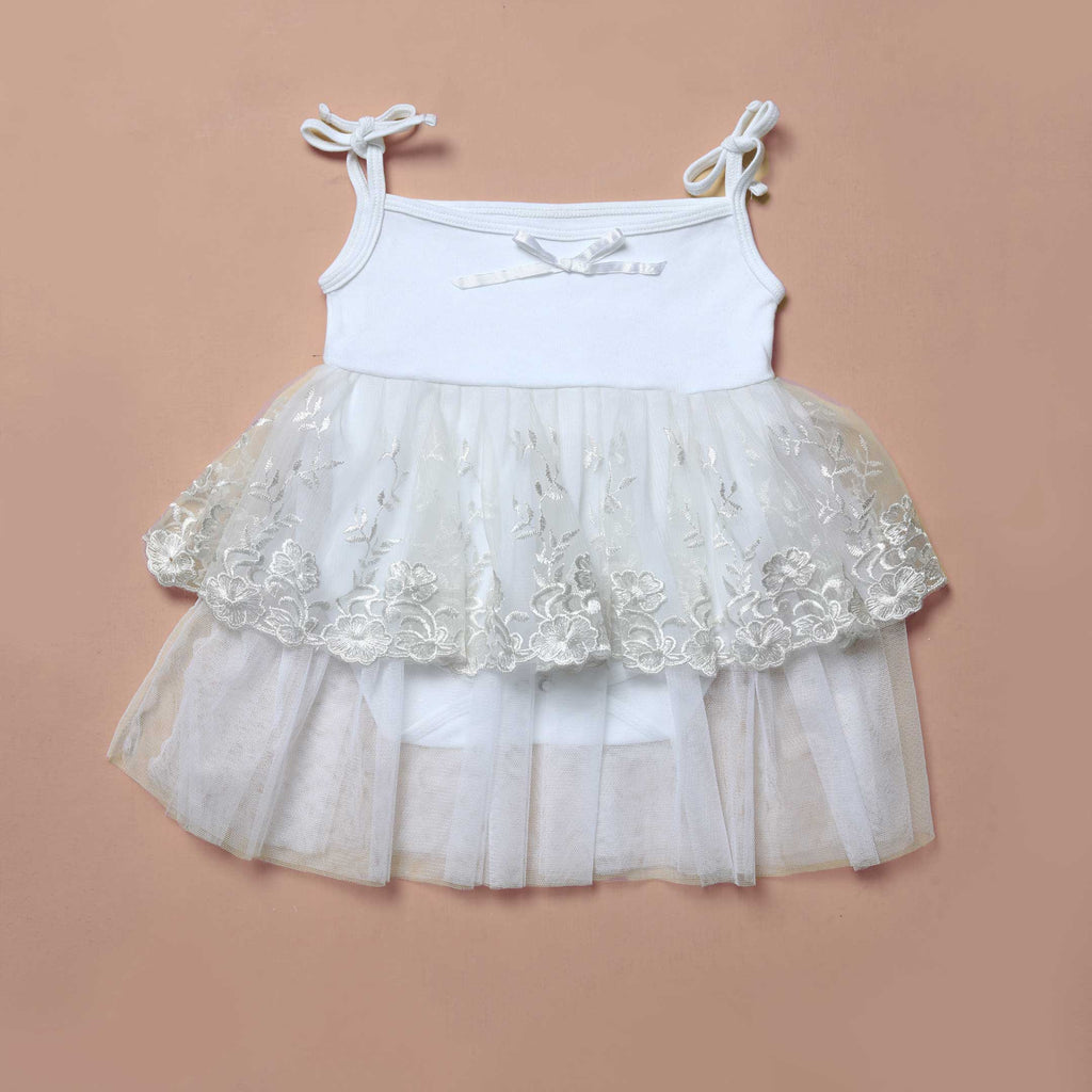 embroidered white ruffled dress