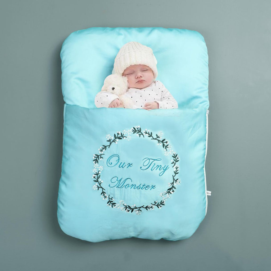 our tiny monster embroidered carry nest