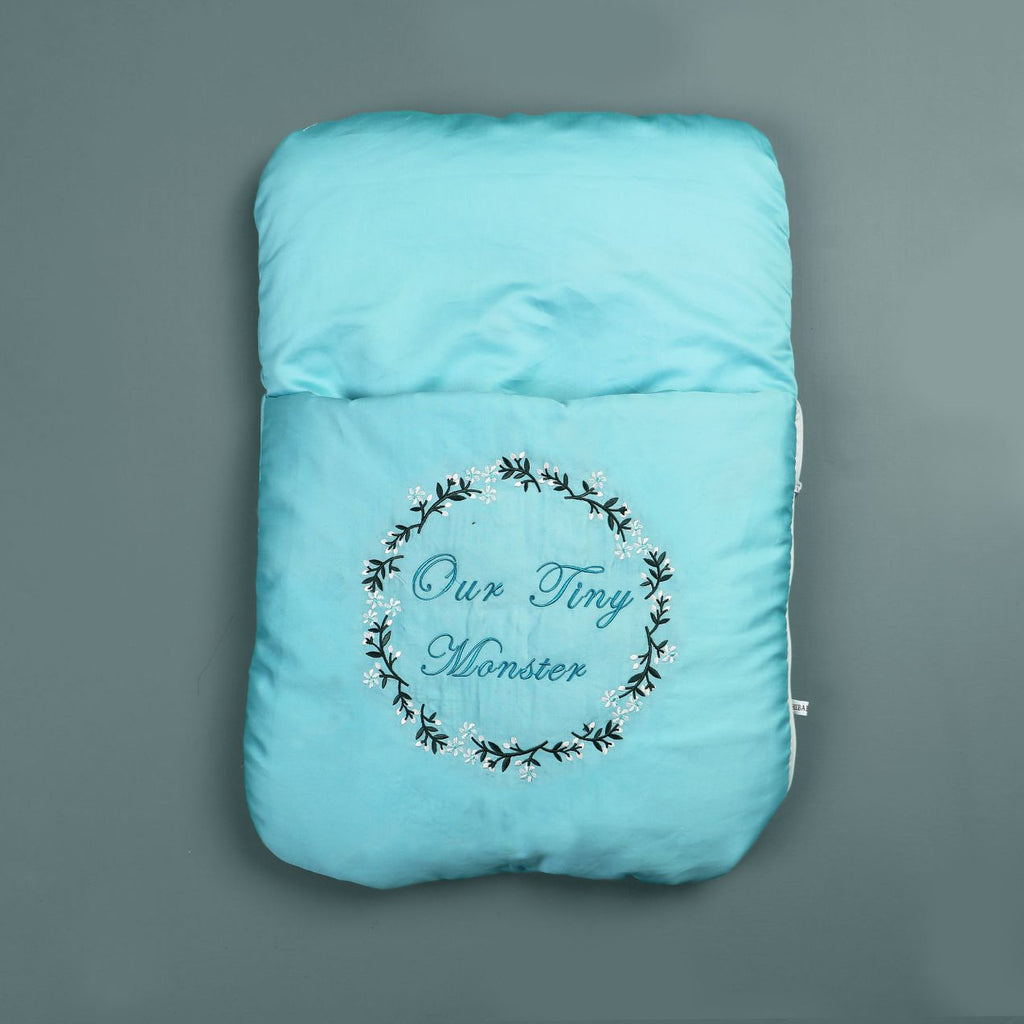 our tiny monster embroidered carry nest