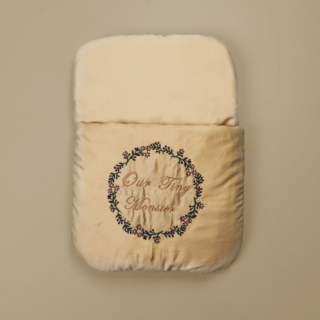 our tiny monster embroidered carry nest