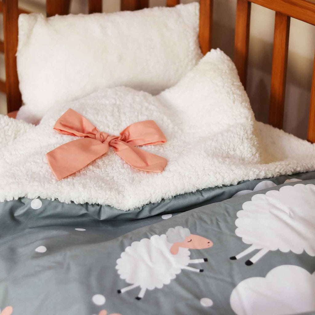 peachy sheep baby cot set
